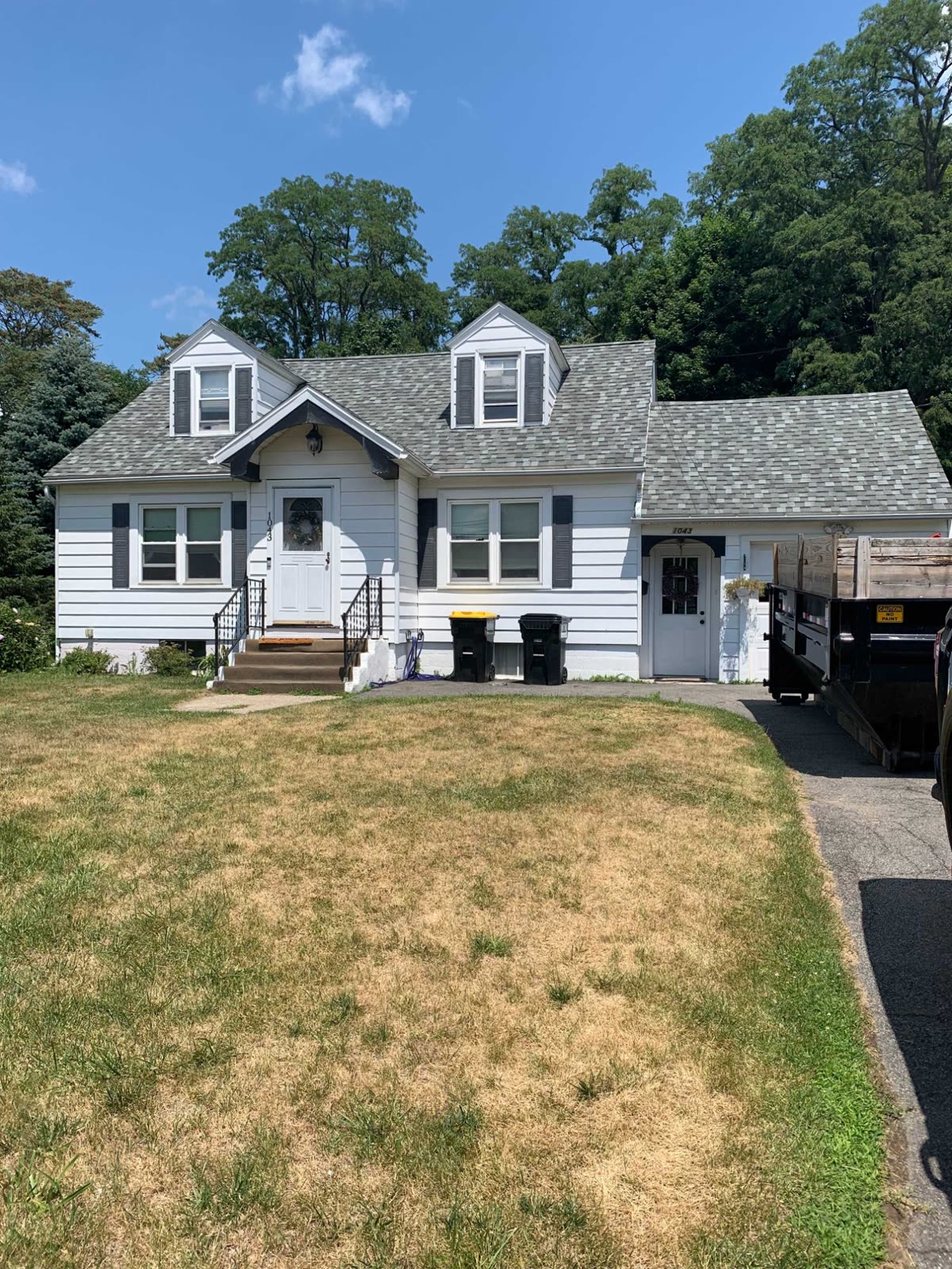 Cape Cod style house in Albany with dormers and a newly replaced roof